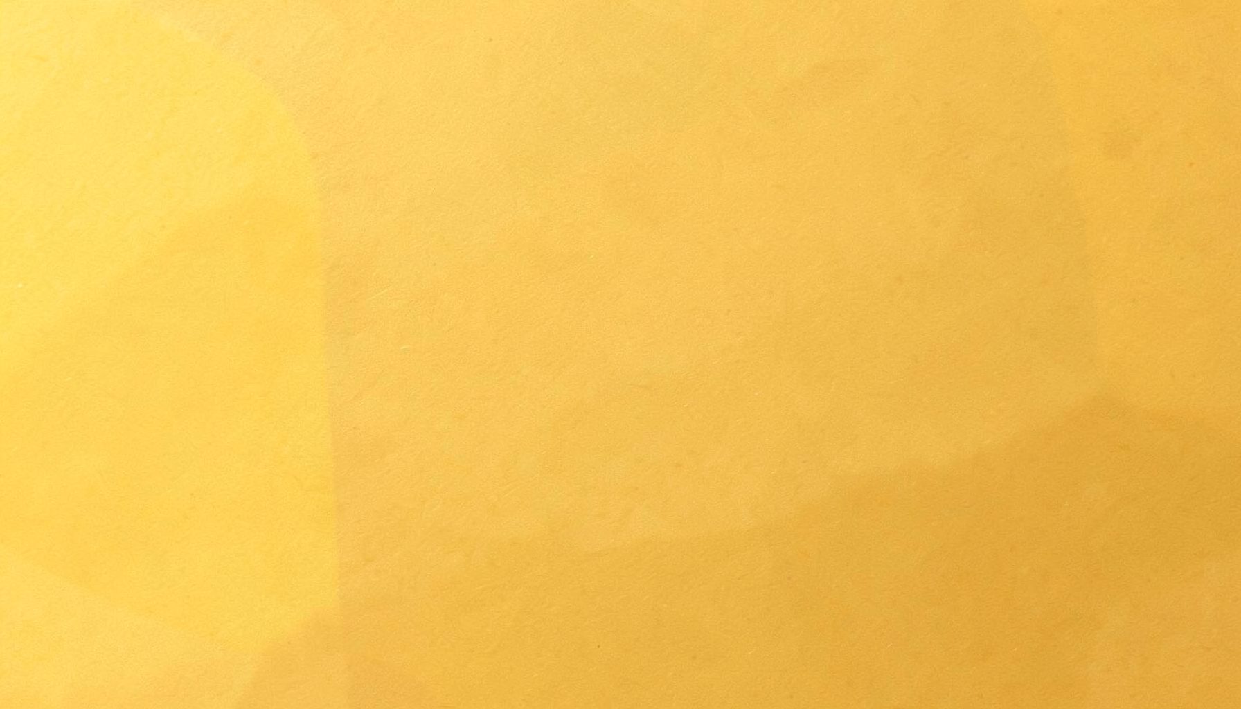 Warm golden-yellow abstract background with subtle paper-texture tones, evoking a clean and professional office atmosphere